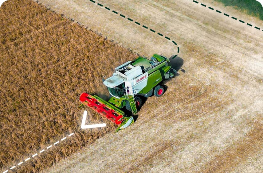 Imagen de una maquina agrícola en un campo de cultivo con un sistema de automatización